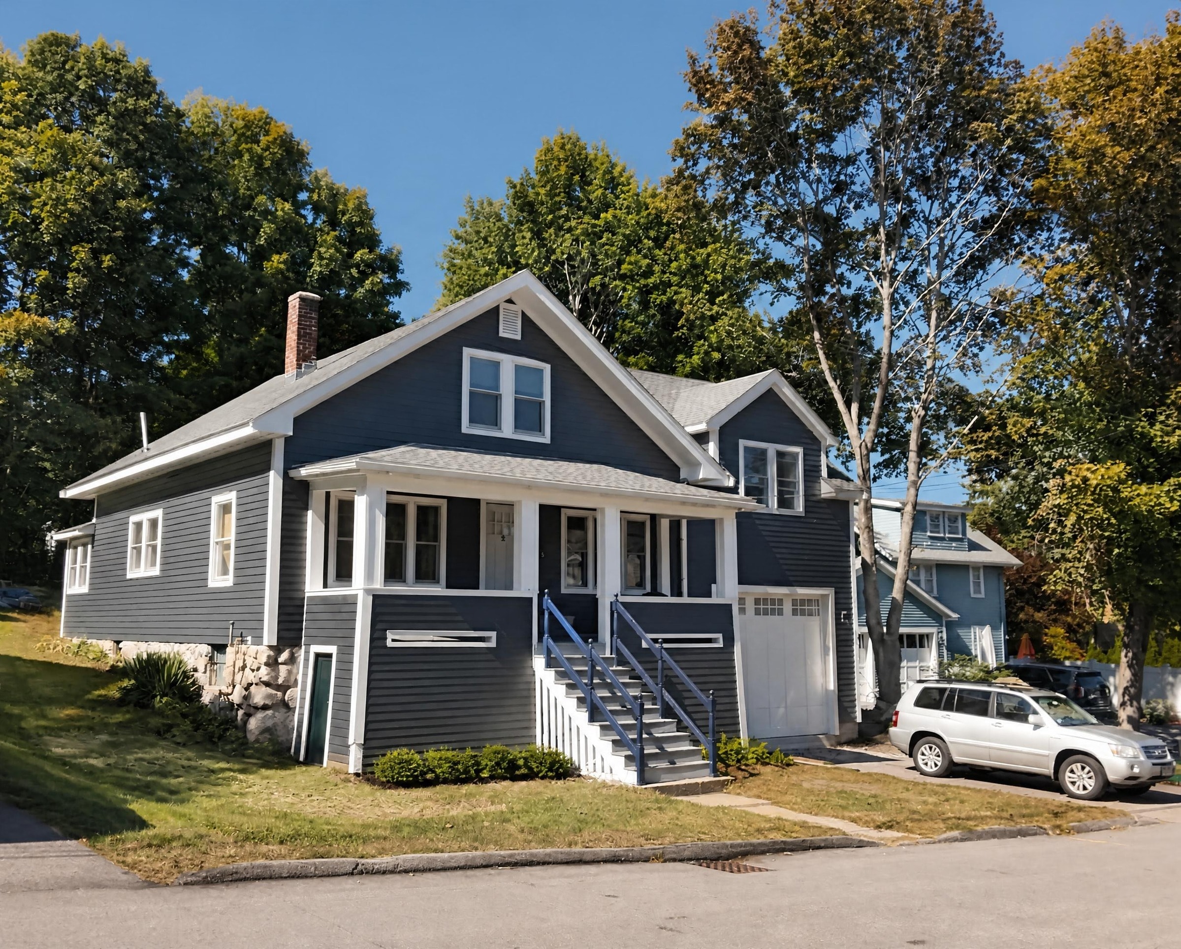 Colonial Home, Lexington — after, angled front view with garage