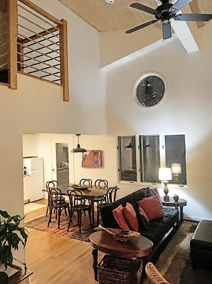 Interior — two-story living and dining space