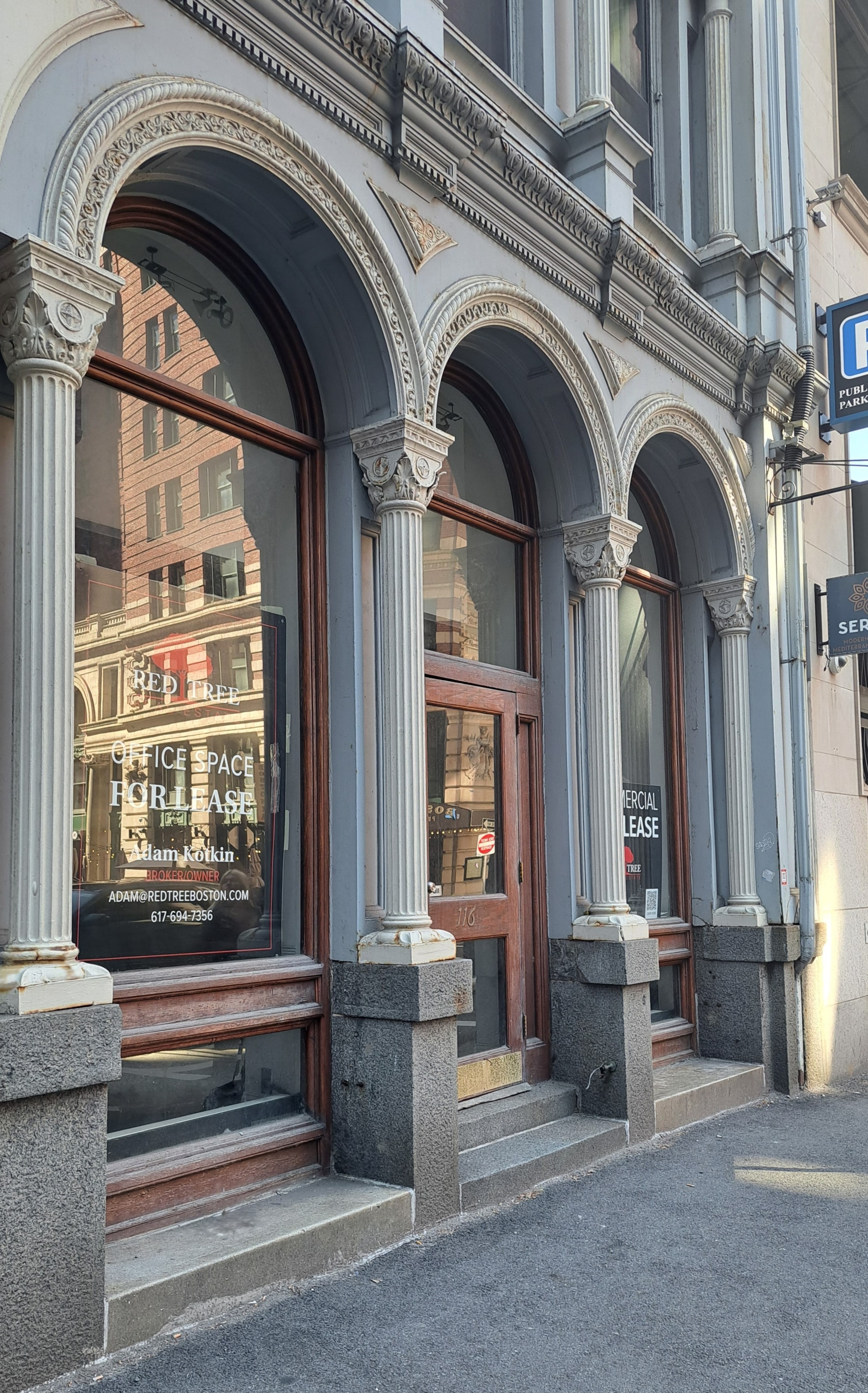 Street-level arcade and storefronts