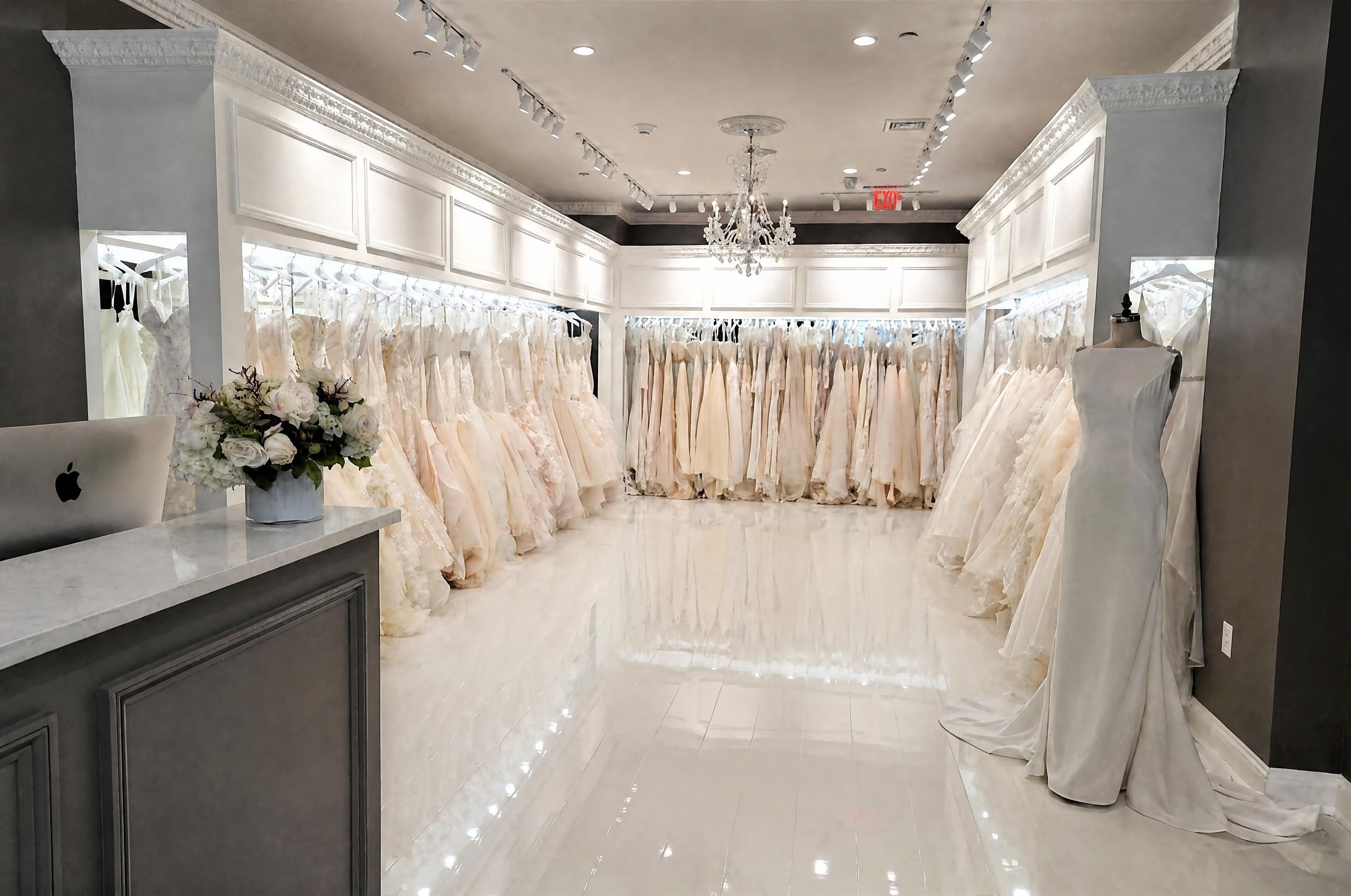 Showroom floor with full gown collection and marble tile