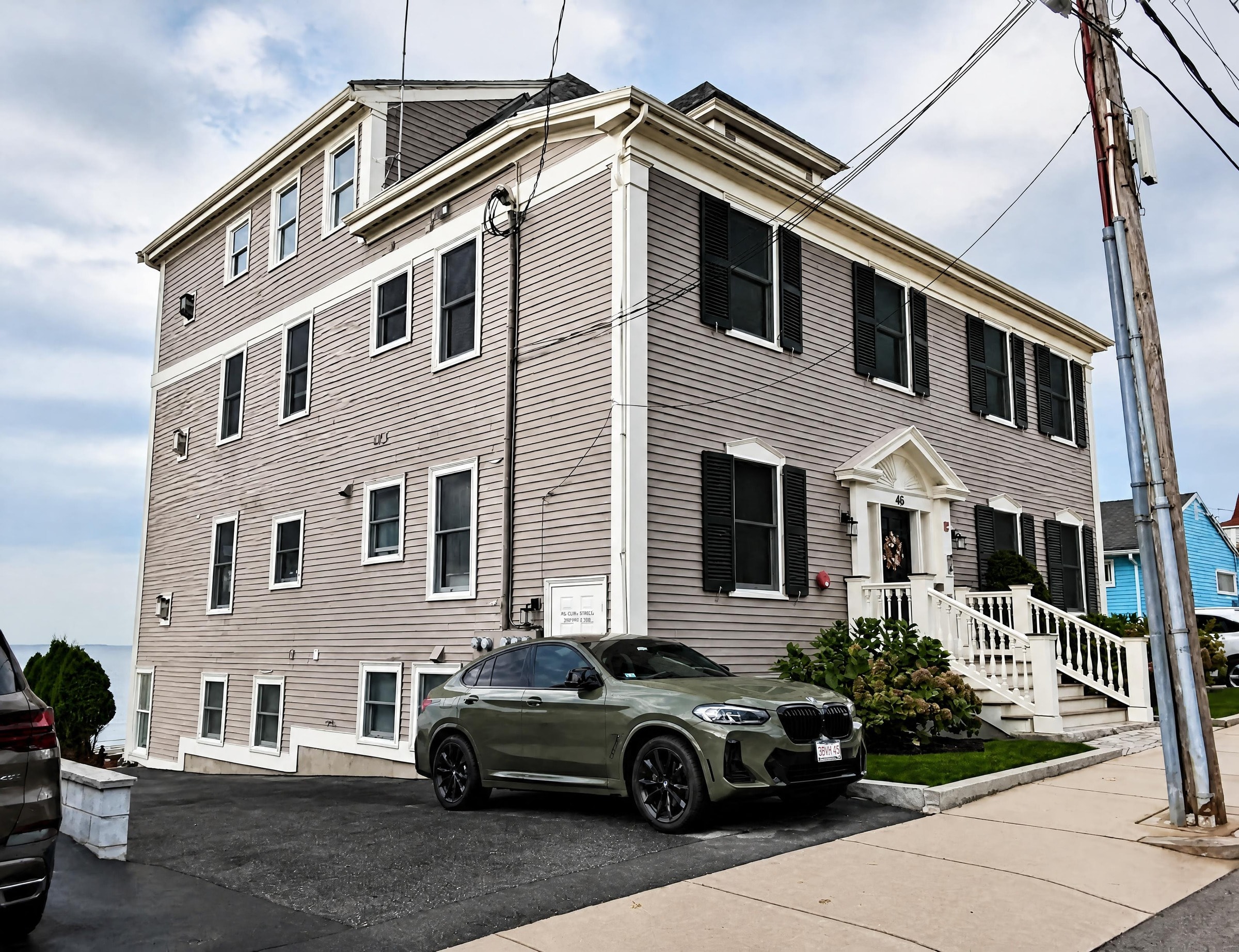 Gray colonial exterior with ocean views